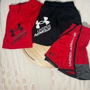 Three pairs of Under Armour shorts size XS boys